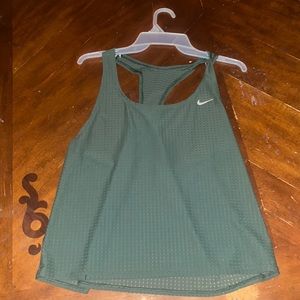 this is a bathing suit cover from nike, it is and olive green